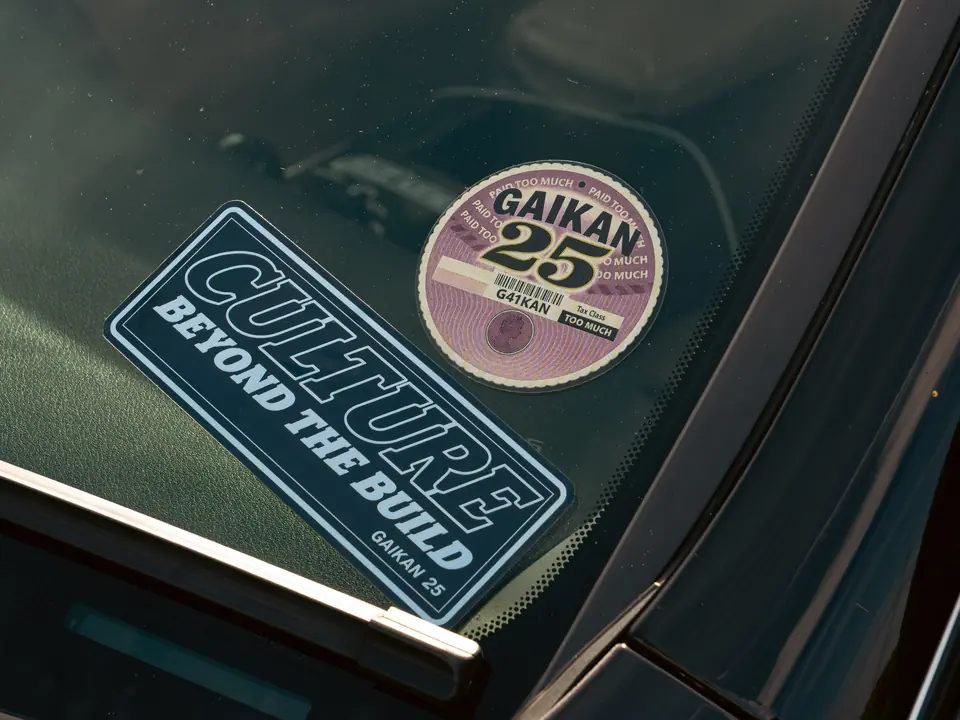 GAIKAN 25 disc and “Culture Beyond The Build” stickers on a windscreen