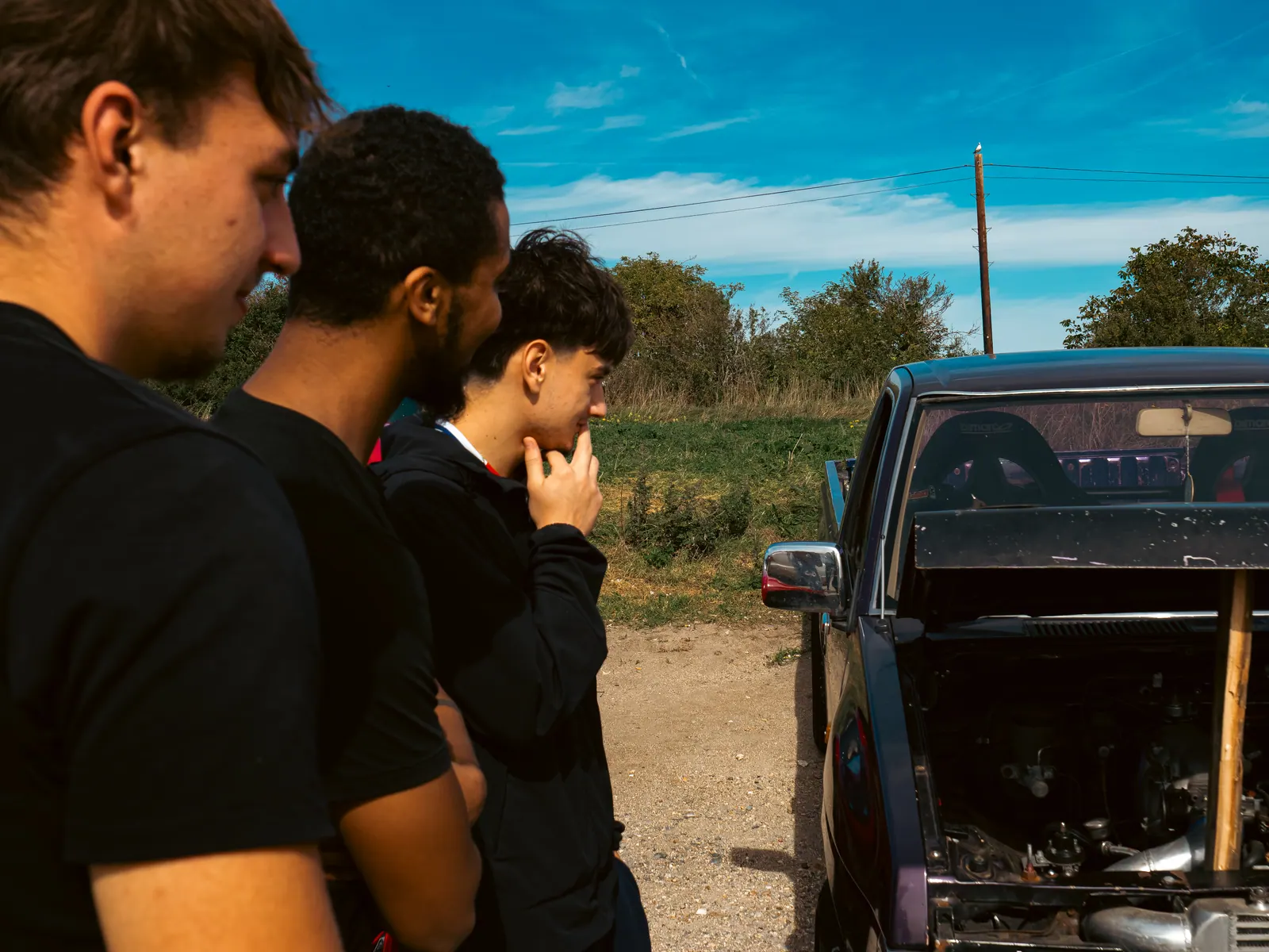 Close crop of friends studying the pick-up