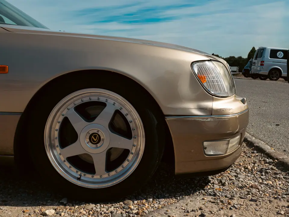 Five-spoke wheel on a gold Lexus LS