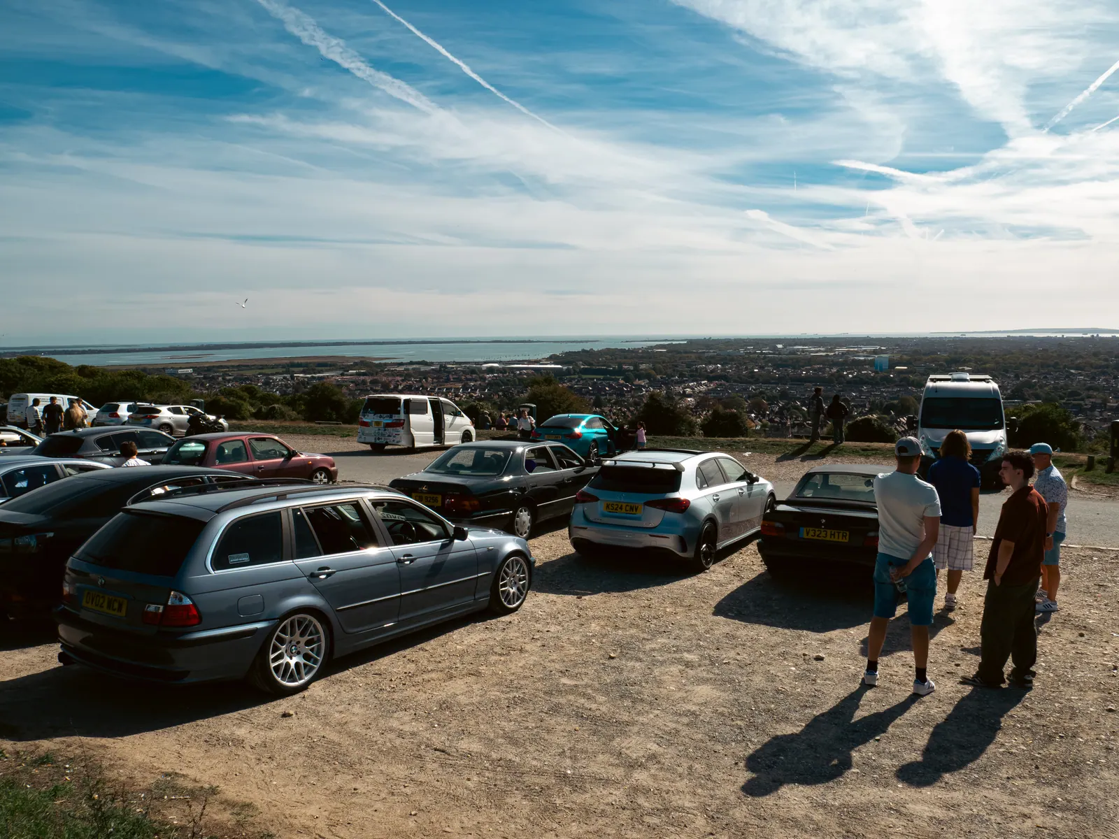 Wide view of the hilltop car park and the harbour below