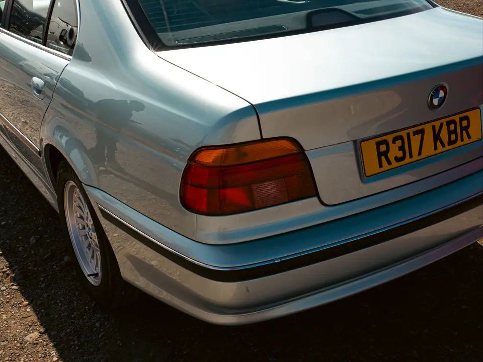 Rear of a silver BMW 5 Series