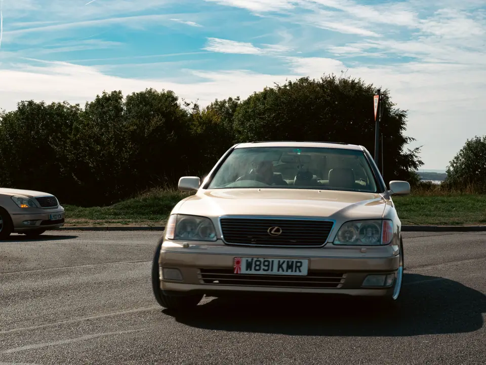 Gold Lexus LS head-on