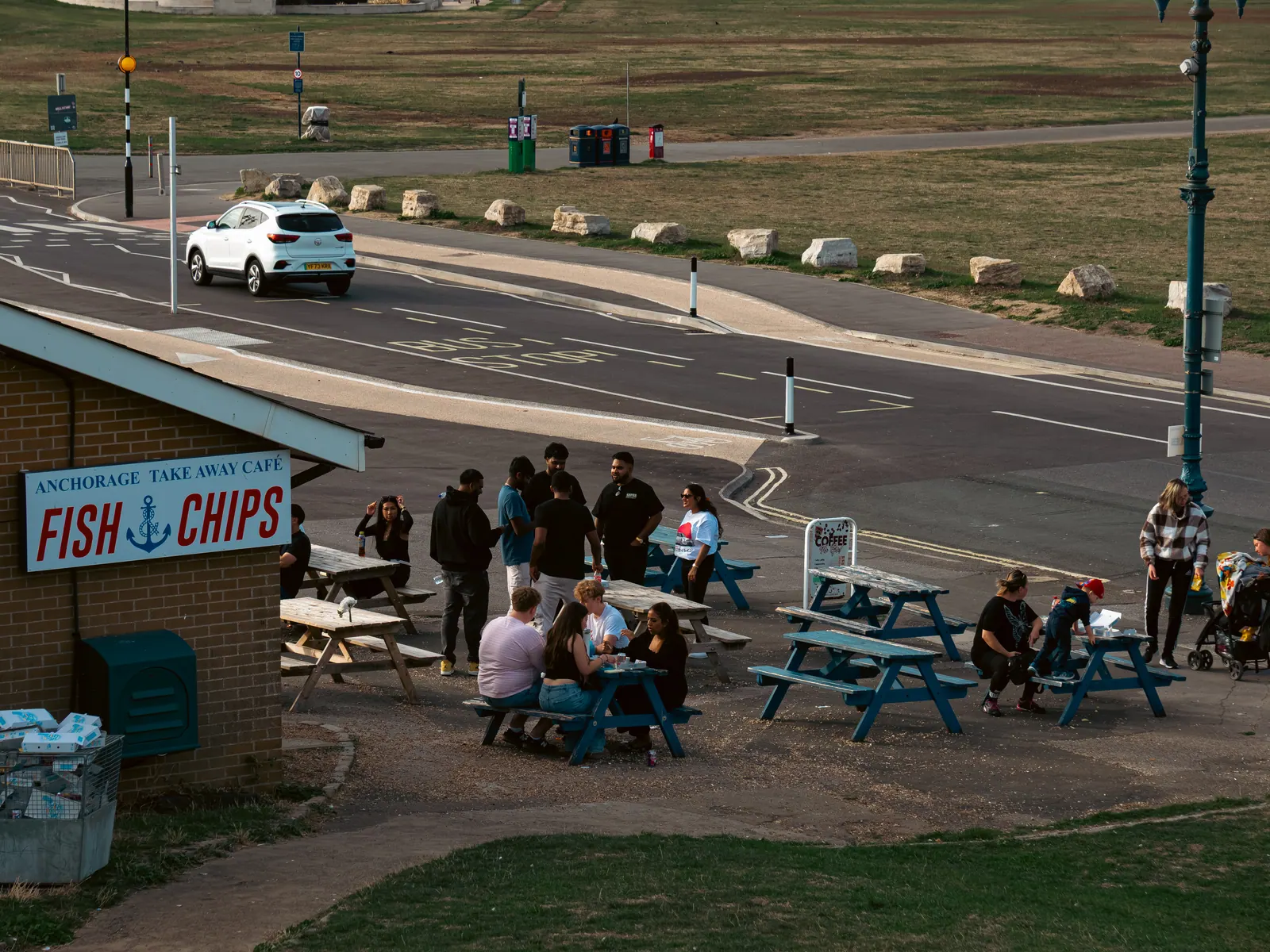 The crew at the fish and chip kiosk tables