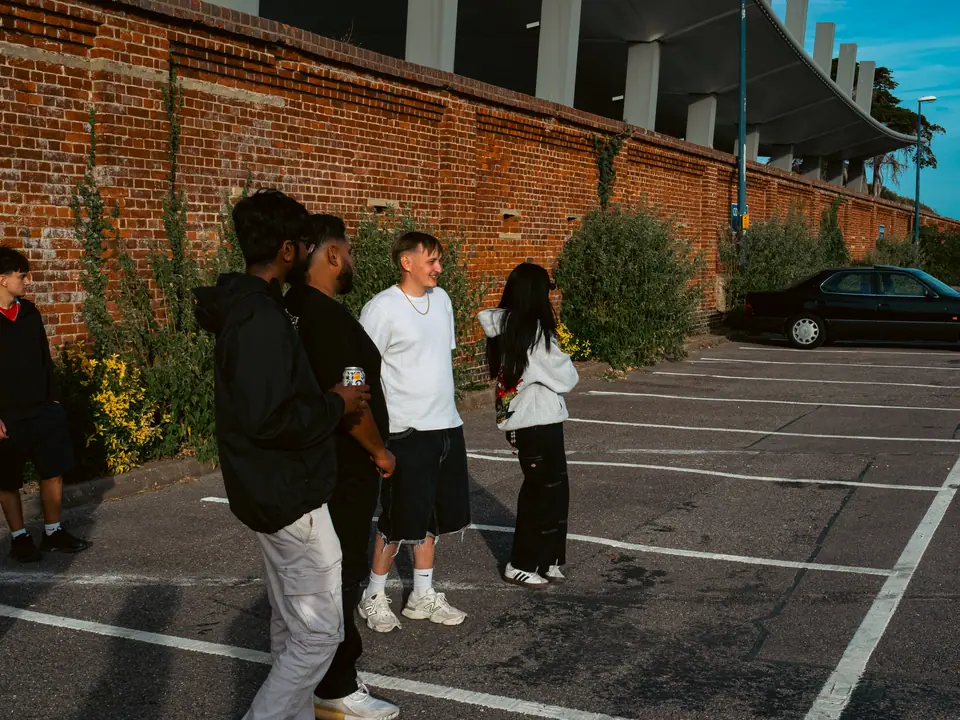 Gathered along the brick wall