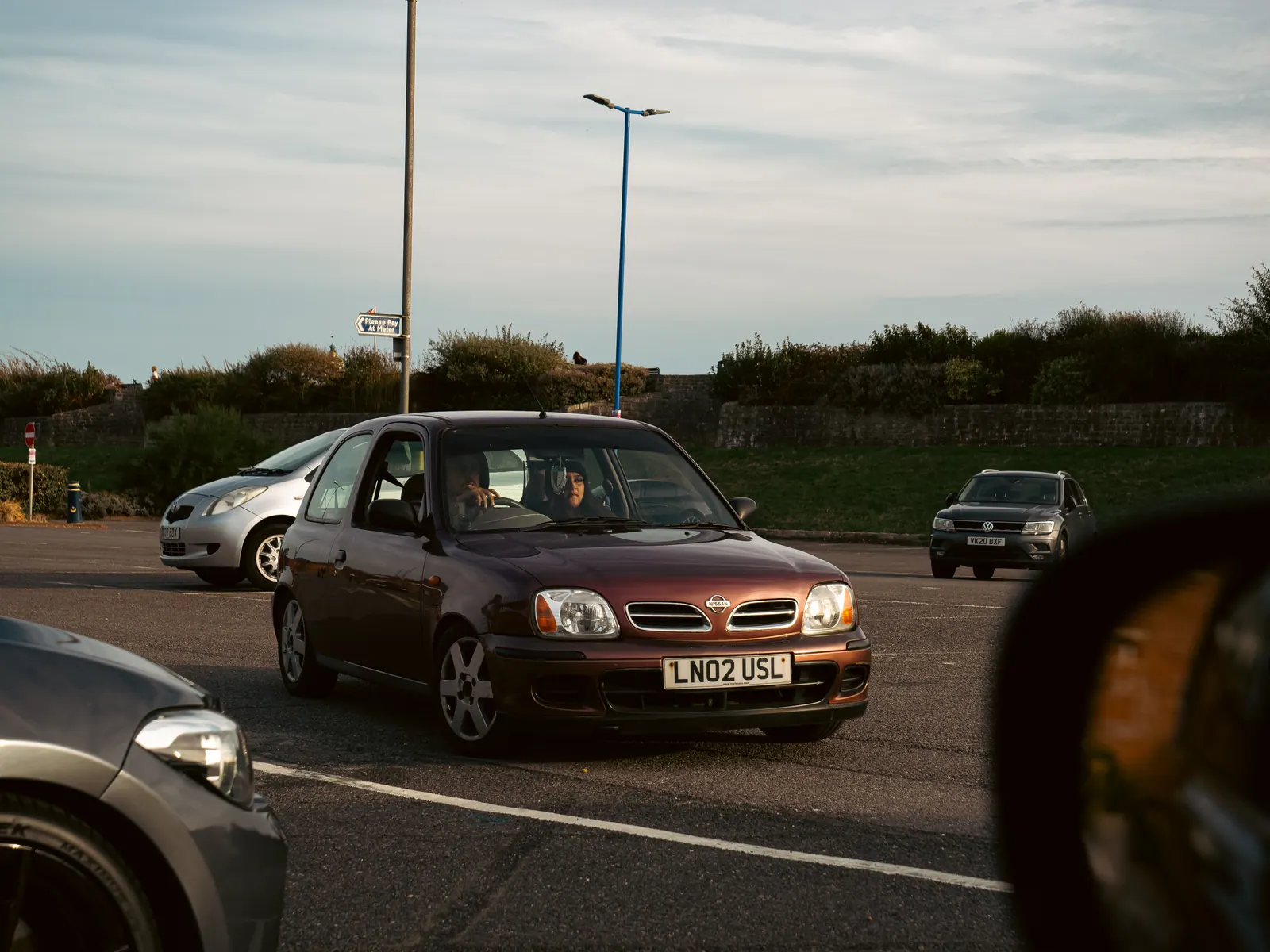 Purple Nissan Micra seen from the chase car