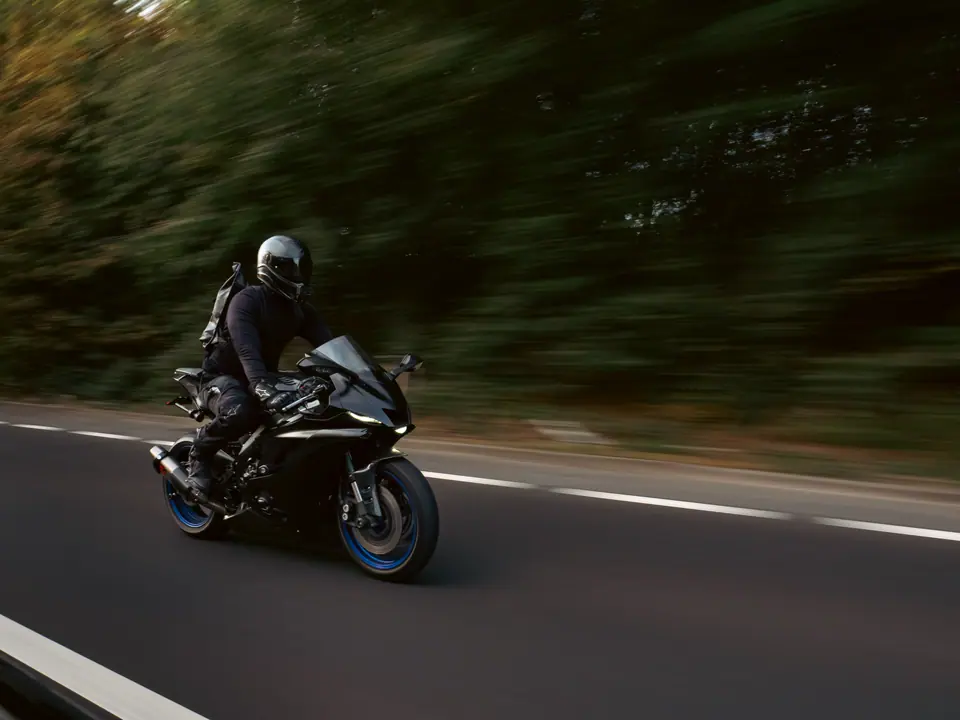 Rider tucked in on the sports bike